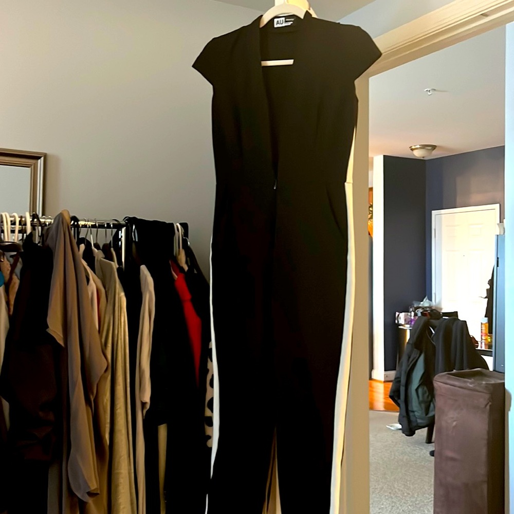 Black Jumpsuit Never Worn with white stripe on each size